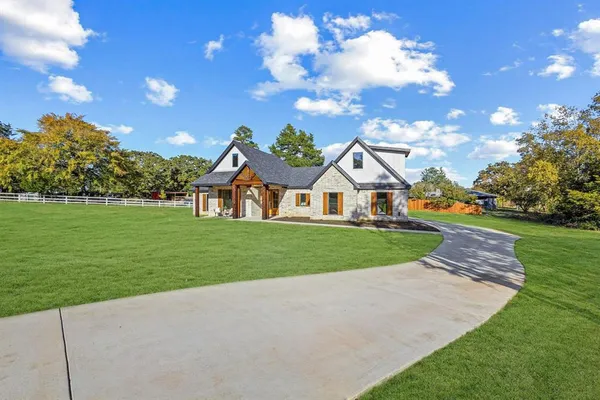 a view of house with garden