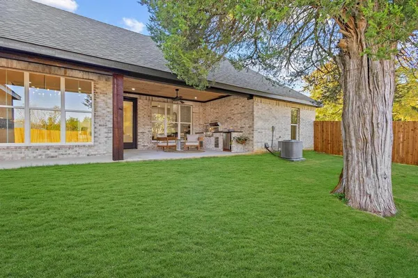 a house view with a garden space