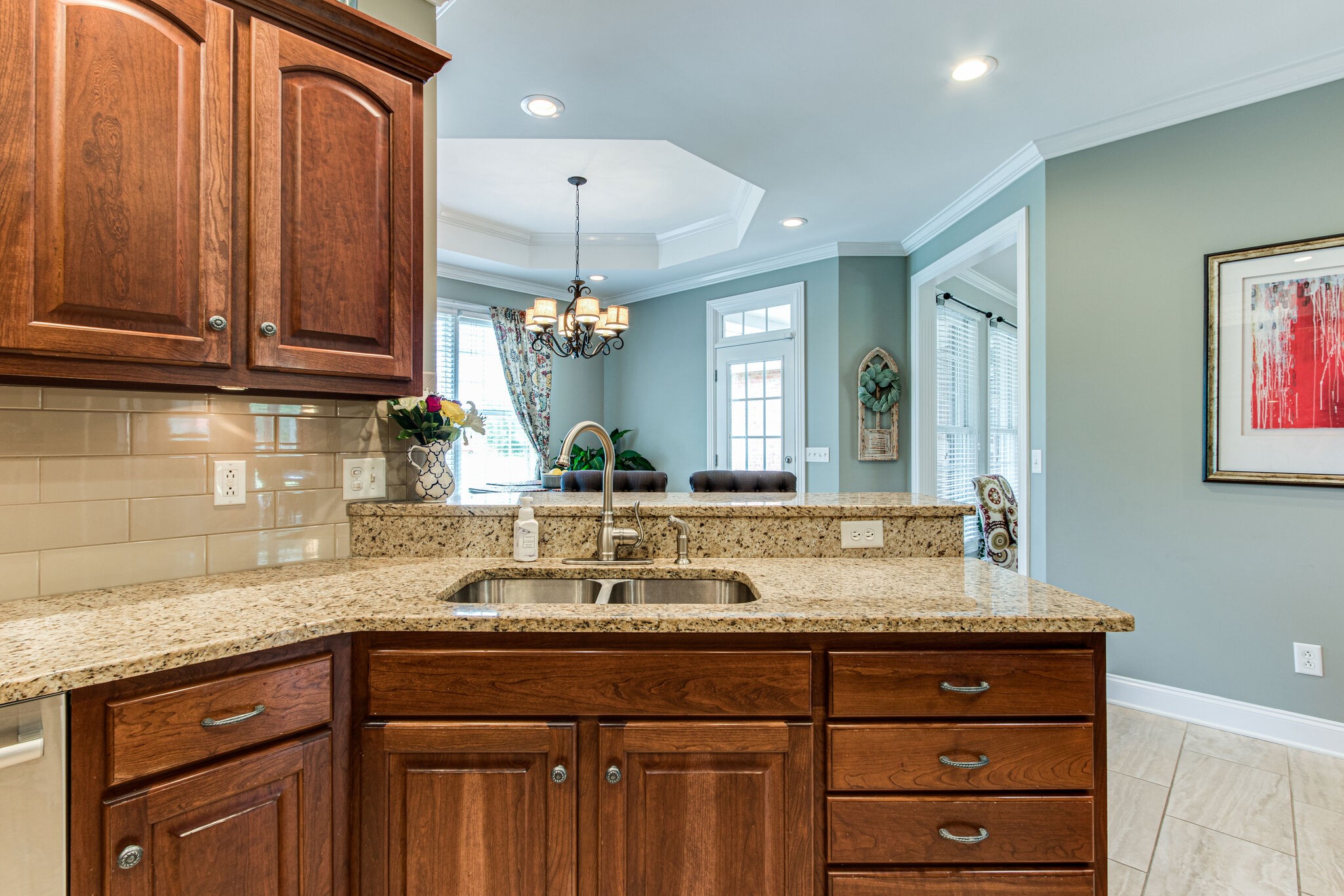 881 Urban Farms Road Manchester, TN 37355 - Photo 27 of 49 a bathroom with a granite countertop sink a mirror and cabinets