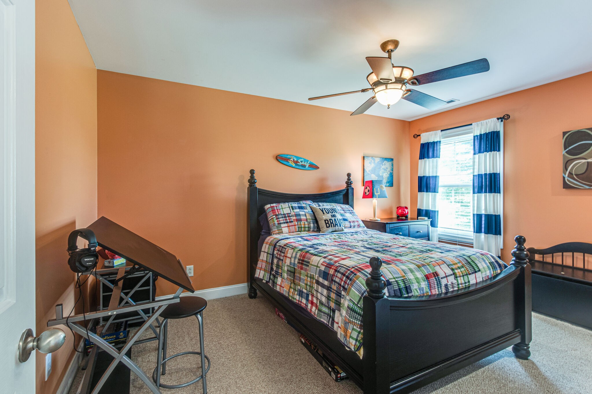 881 Urban Farms Road Manchester, TN 37355 - Photo 33 of 49 a bedroom with a bed and a chandelier