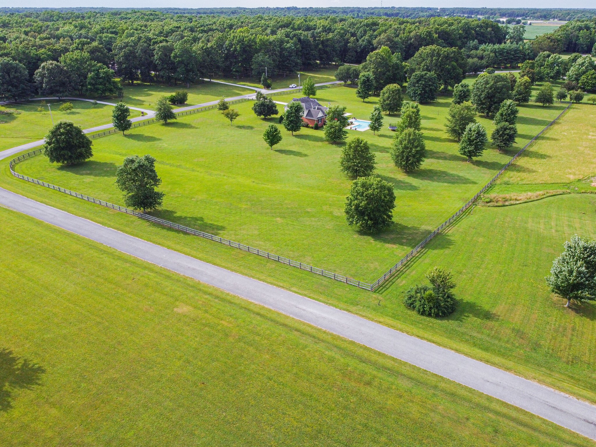 881 Urban Farms Road Manchester, TN 37355 - Photo 47 of 49 a view of an swimming pool with a yard