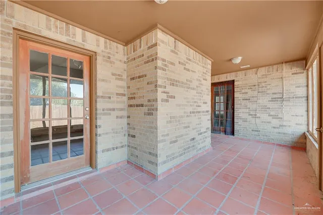 a view of outdoor space with wooden floor and window