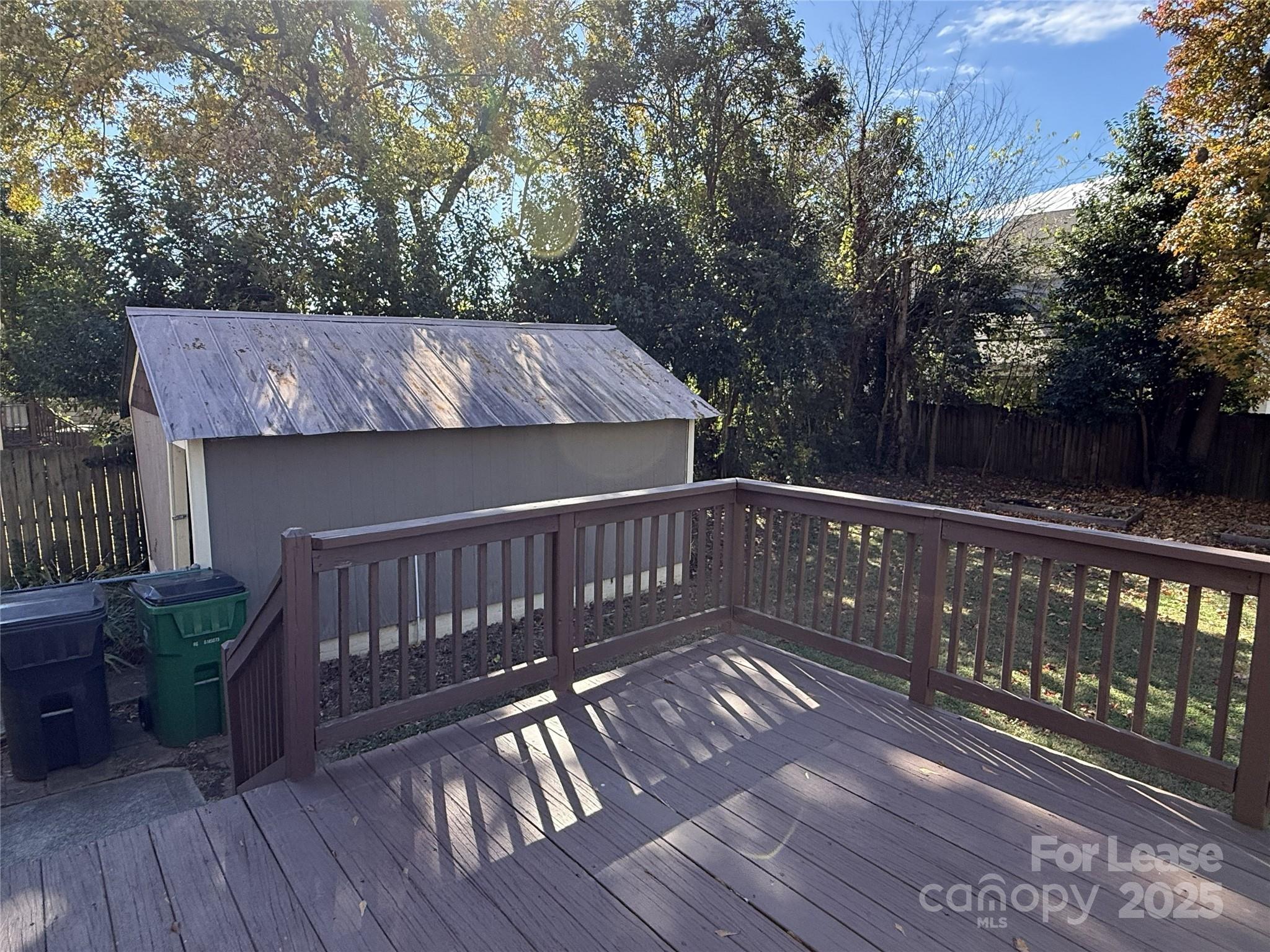 350 Melbourne Court Charlotte, NC 28209 - Photo 20 of 22 a view of deck with wooden floor and outdoor seating