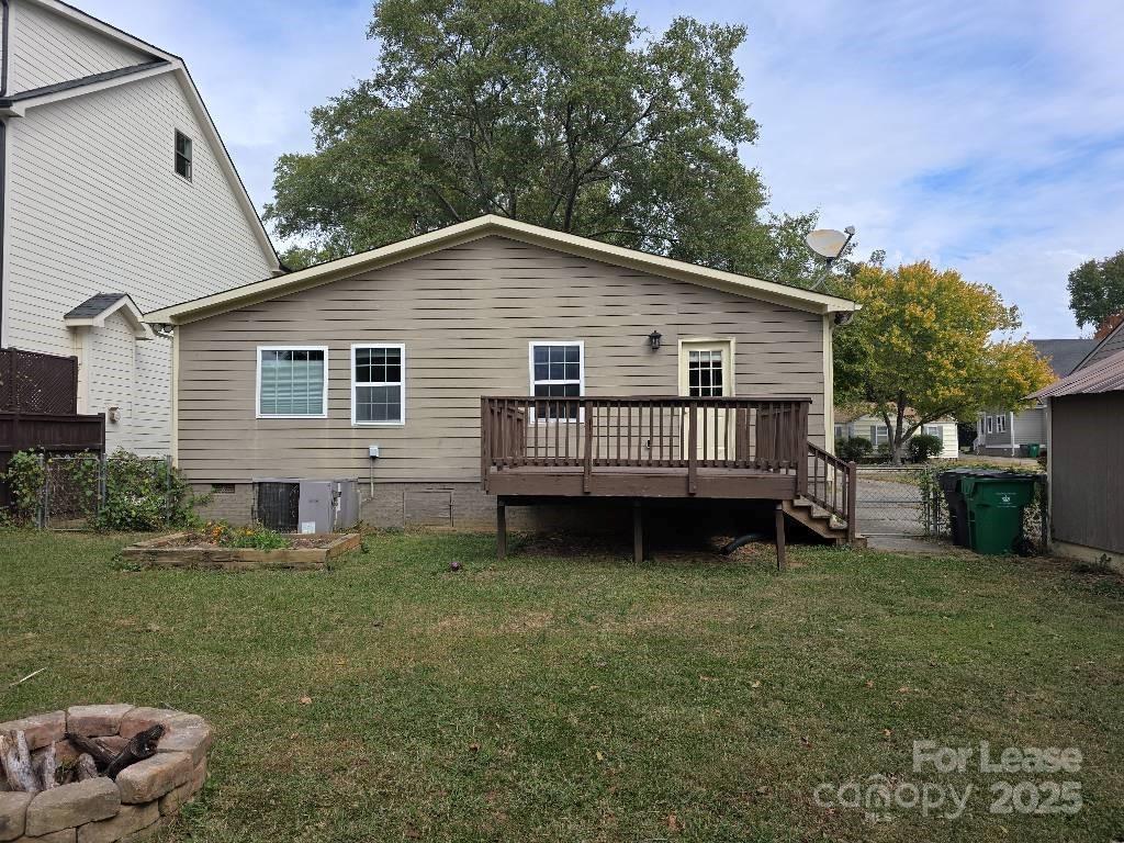 350 Melbourne Court Charlotte, NC 28209 - Photo 21 of 22 a view of a house with a yard