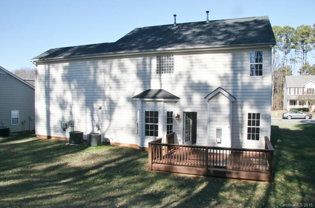 6714 Reedy Creek Road, Unit 2 Charlotte, NC 28215 - Photo 22 of 23 a front view of a house with garden