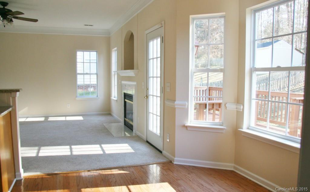 6714 Reedy Creek Road, Unit 2 Charlotte, NC 28215 - Photo 7 of 23 a view of a hallway with windows