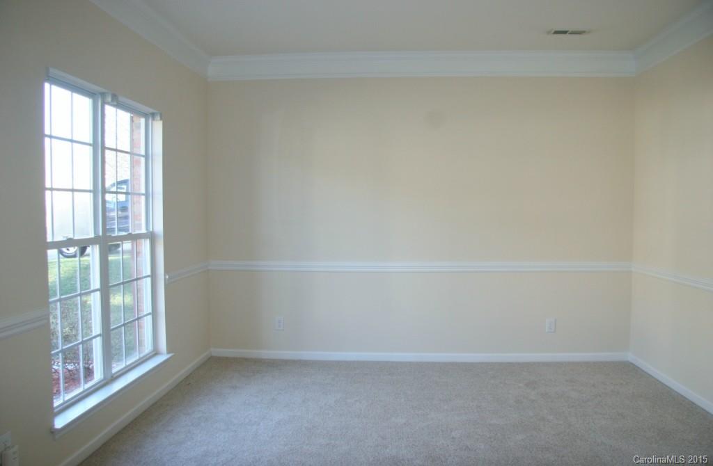 6714 Reedy Creek Road, Unit 2 Charlotte, NC 28215 - Photo 9 of 23 a view of an empty room with a window