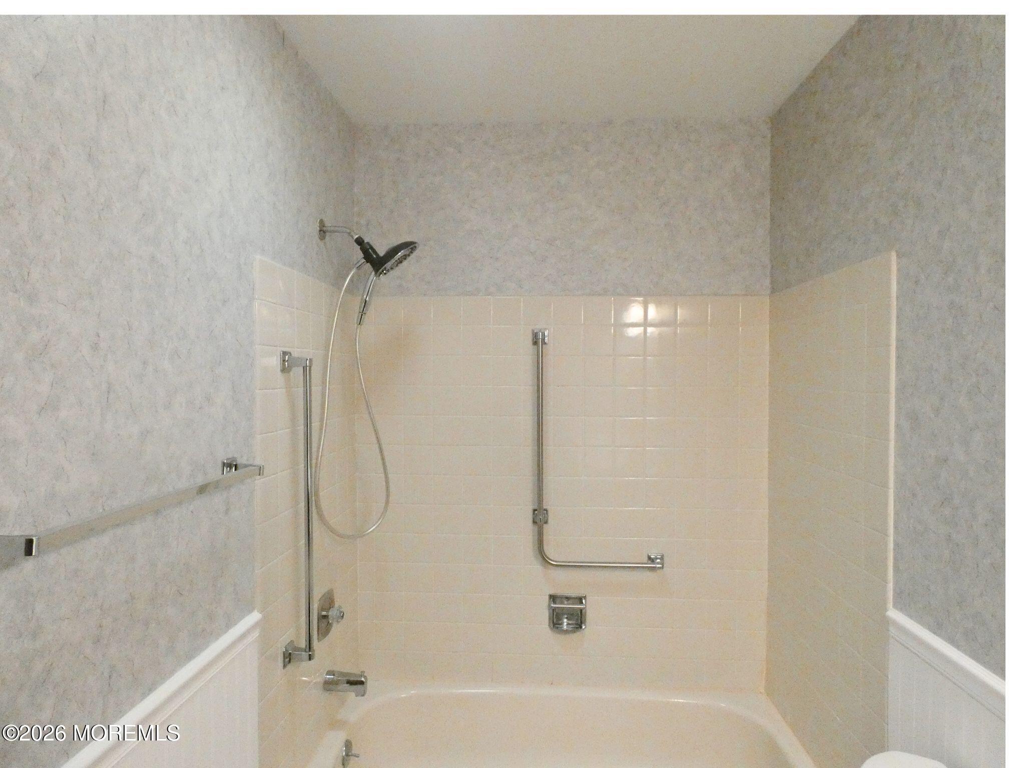 33D Medford Road, Unit A Manchester Township, NJ 08759 - Photo 20 of 24 a bathroom with a bathtub