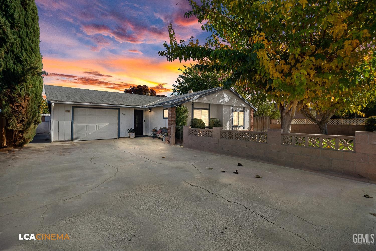 Undisclosed Address Taft, CA 93268 - Photo 1 of 20 a front view of a house with a garage