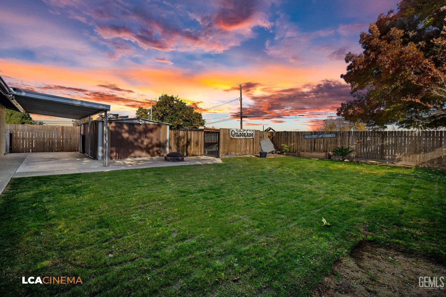 Undisclosed Address Taft, CA 93268 - Photo 14 of 20 a view of a backyard with a garden