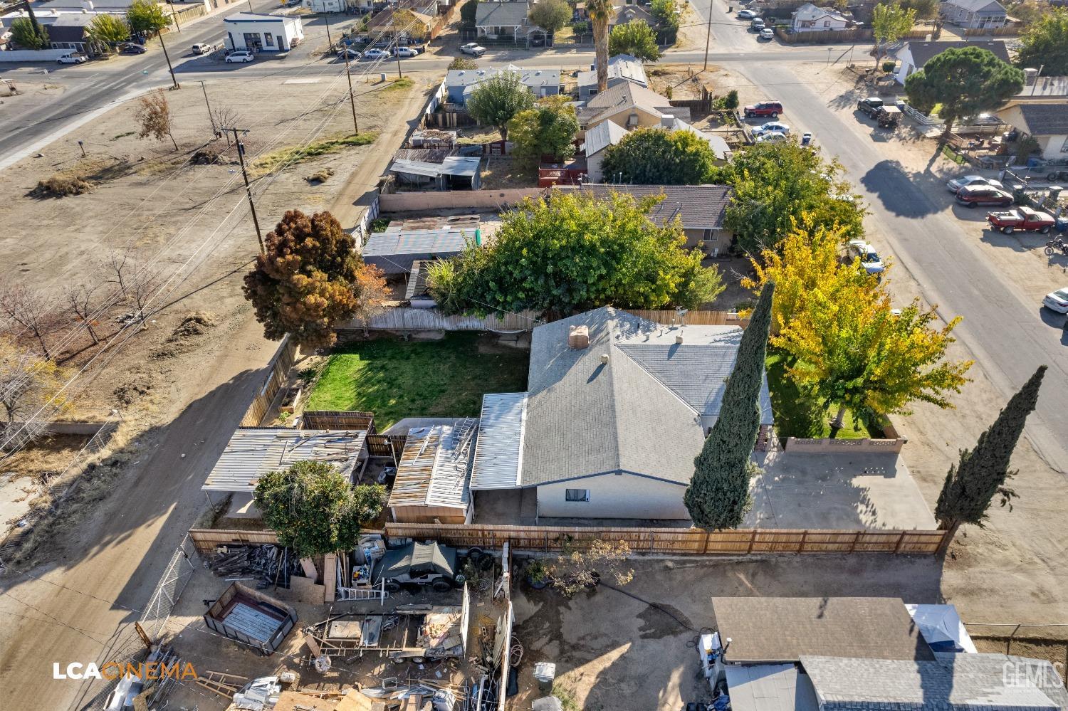 Undisclosed Address Taft, CA 93268 - Photo 20 of 20 an aerial view of a house with a yard