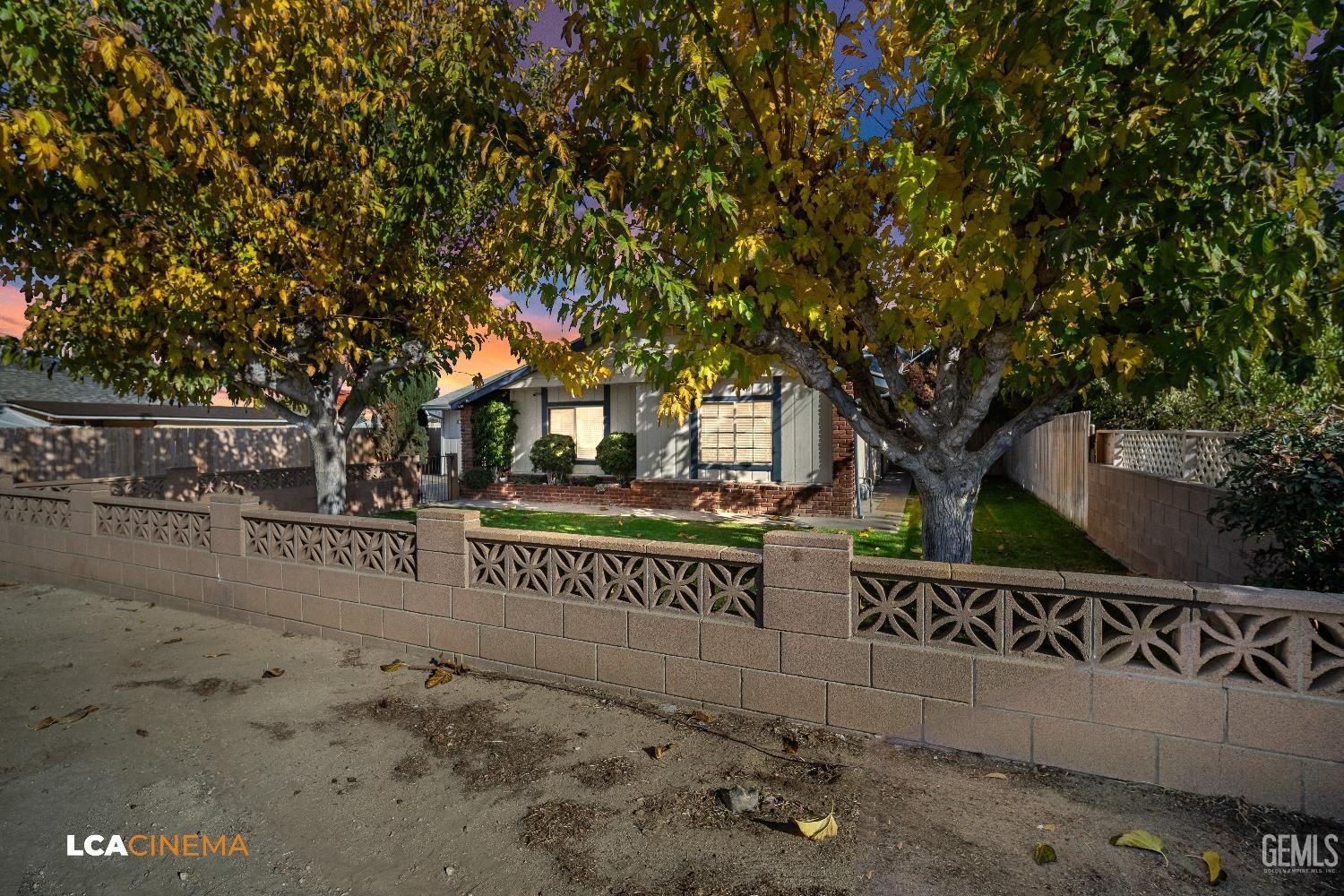 Undisclosed Address Taft, CA 93268 - Photo 3 of 20 a front view of a house with parking