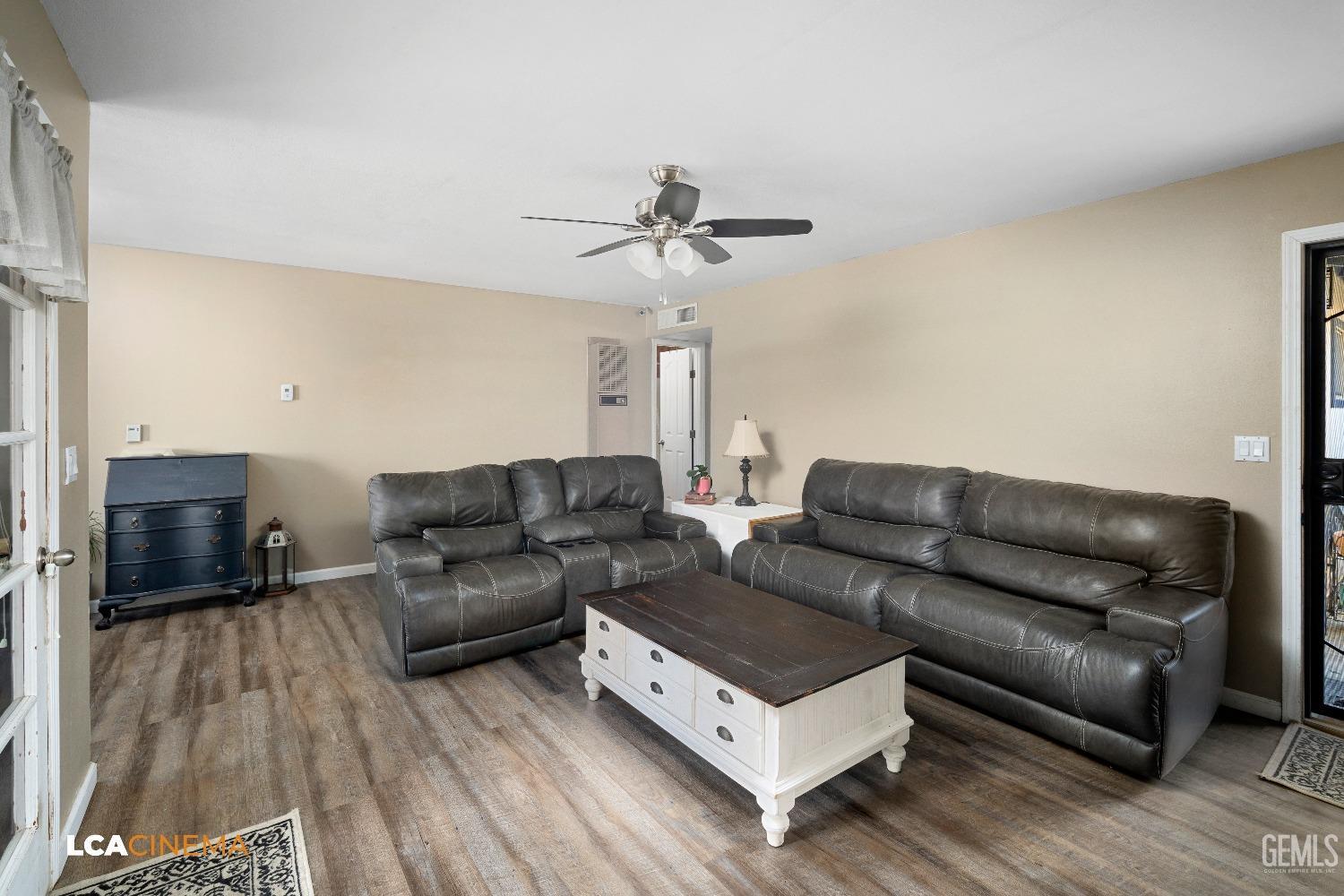 Undisclosed Address Taft, CA 93268 - Photo 4 of 20 a living room with furniture and a flat screen tv
