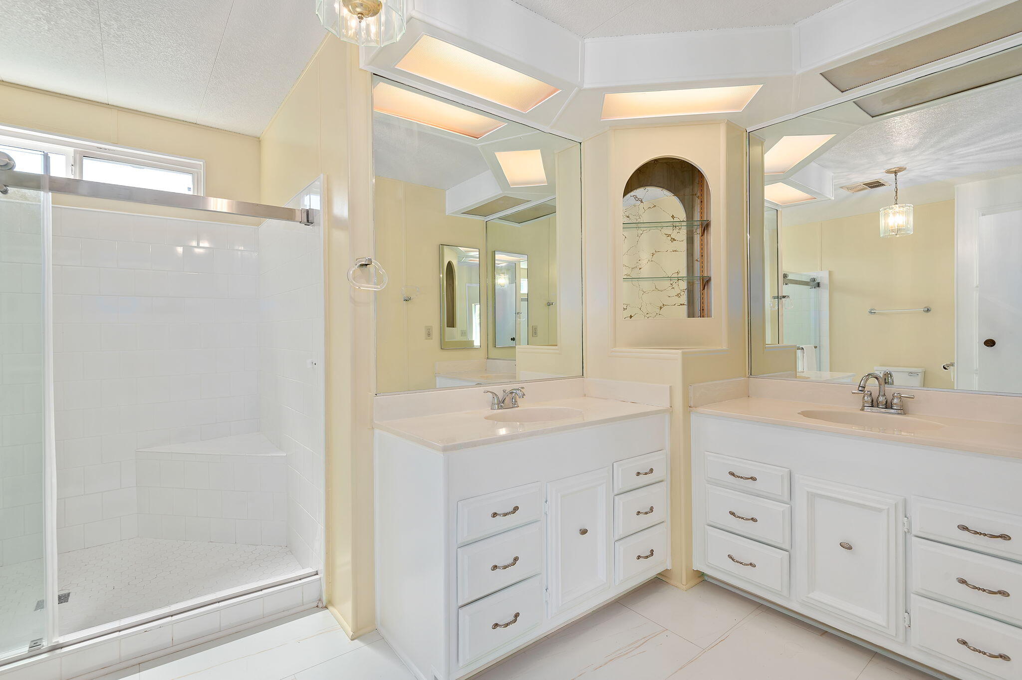 340 Old Mill Road, Unit SPC 12 Santa Barbara, CA 93110 - Photo 17 of 35 a spacious bathroom with a granite countertop sink mirror and shower