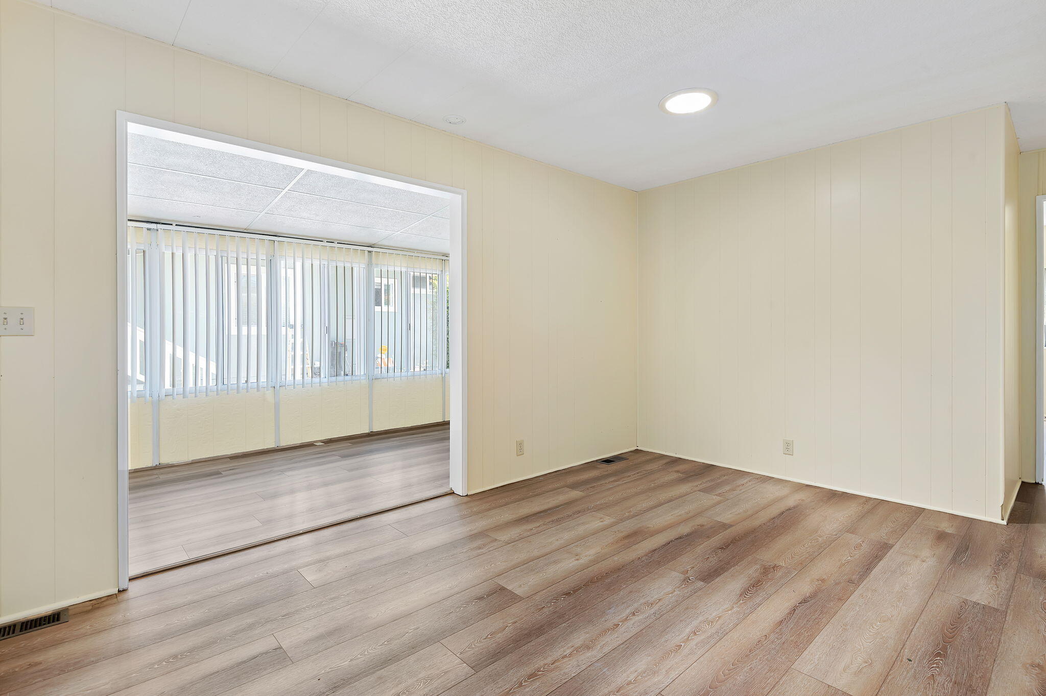 340 Old Mill Road, Unit SPC 12 Santa Barbara, CA 93110 - Photo 8 of 35 an empty room with wooden floor and windows
