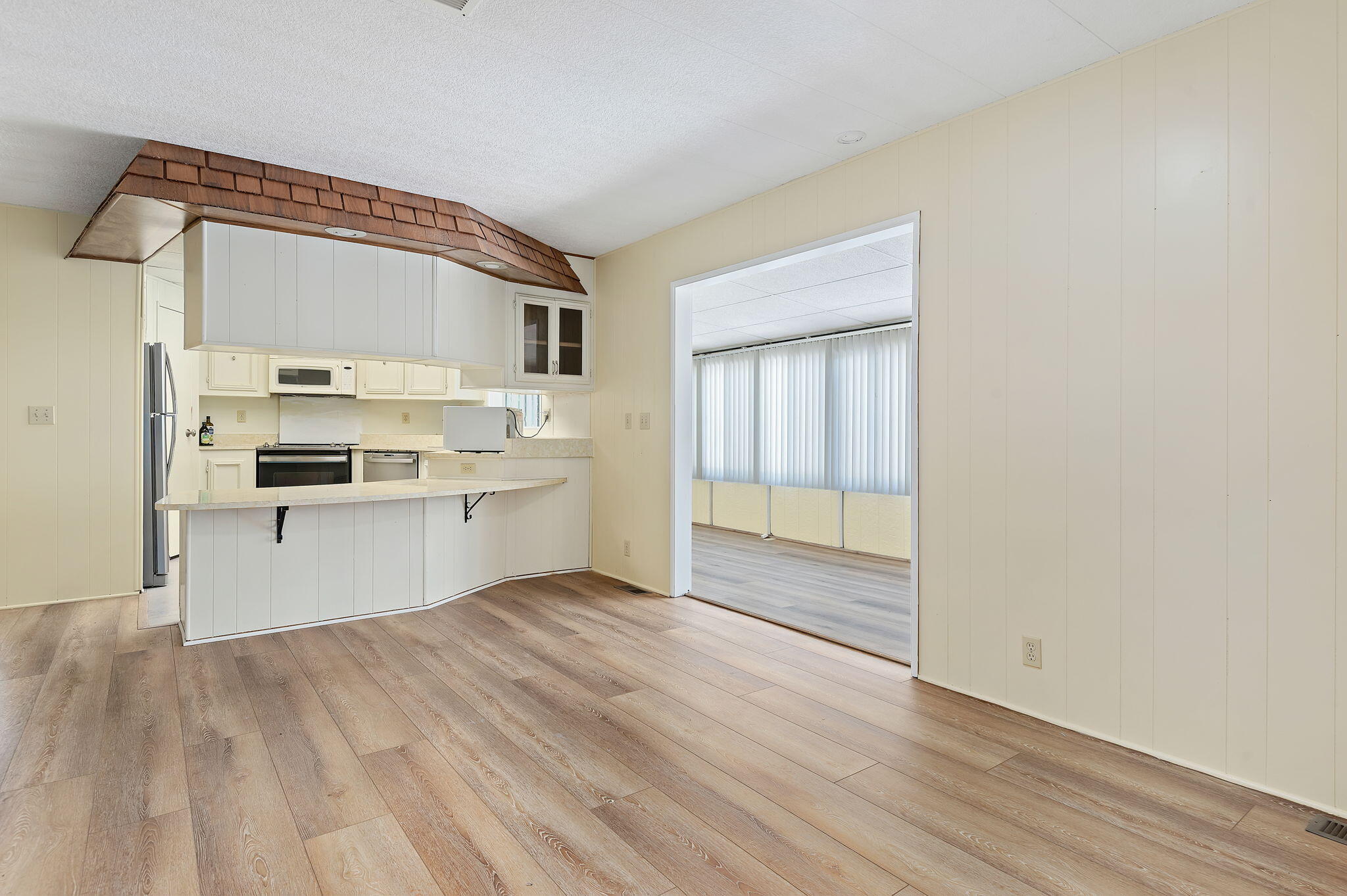 340 Old Mill Road, Unit SPC 12 Santa Barbara, CA 93110 - Photo 10 of 35 a view of kitchen with wooden floor