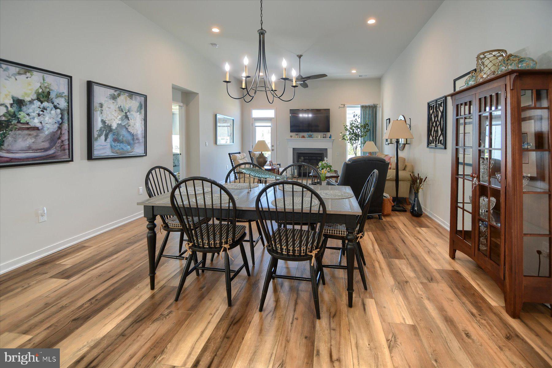 6963 Maple Drive Bath, PA 18014 - Photo 15 of 46 a view of a dining room with furniture window and wooden floor