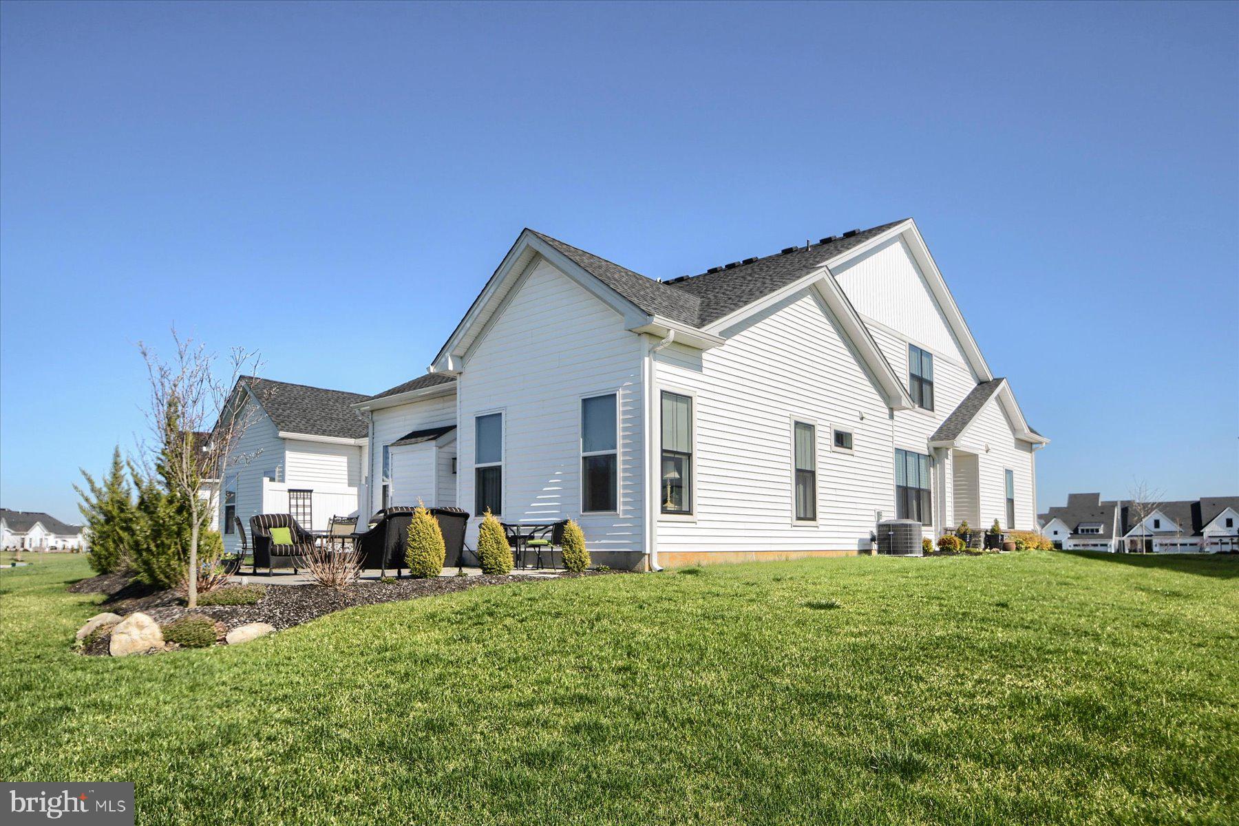 6963 Maple Drive Bath, PA 18014 - Photo 40 of 46 a front view of house with yard and green space