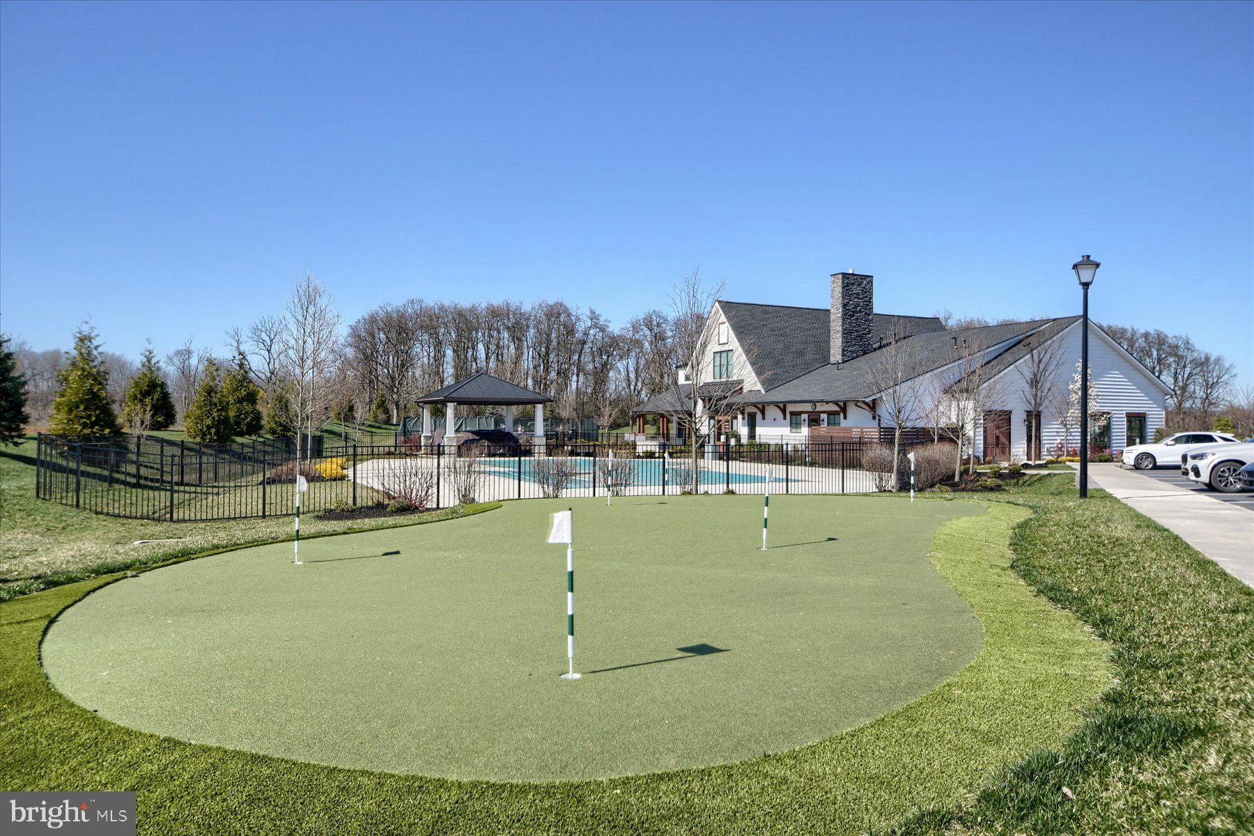 6963 Maple Drive Bath, PA 18014 - Photo 45 of 46 a view of a swimming pool with a yard