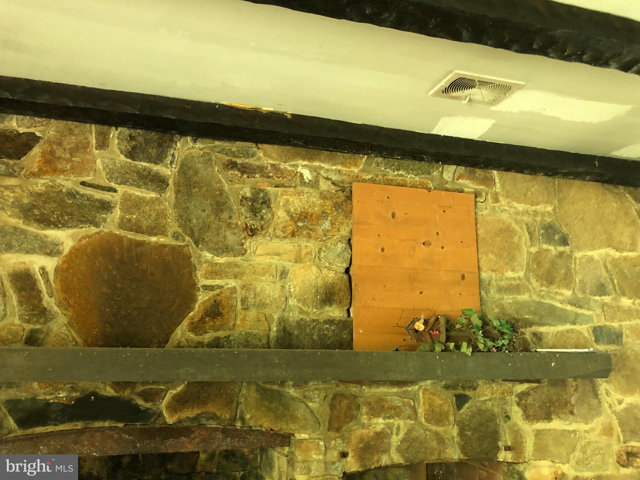 55 Mt Marshall Road Washington, VA 22747 - Photo 3 of 13 Huge, stone fireplace, hearth & exposed chimney.