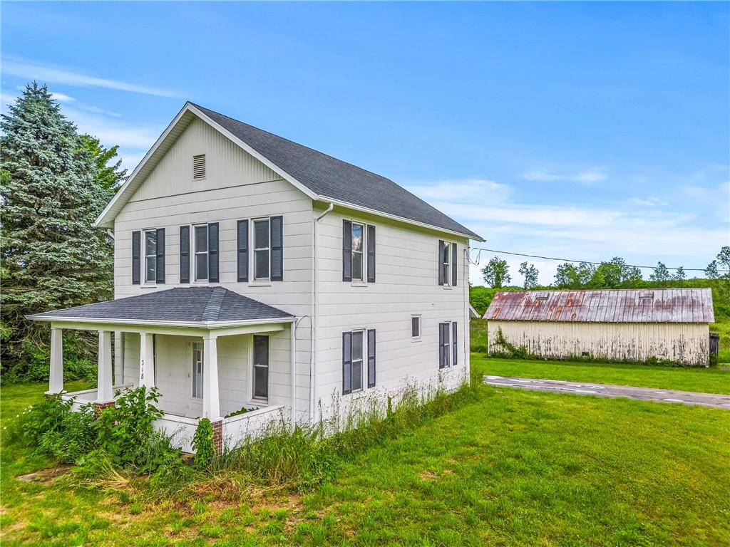 318 Old Ash Road Mercer, PA 16137 - Photo 1 of 15 a front view of a house with a yard