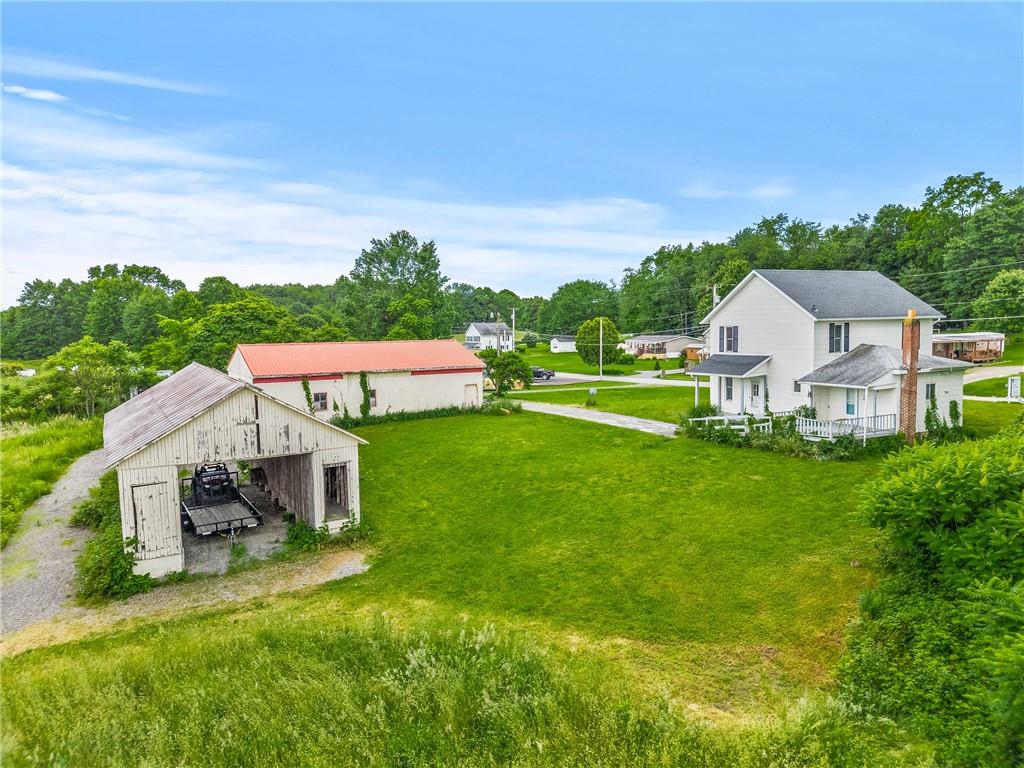 318 Old Ash Road Mercer, PA 16137 - Photo 11 of 15 a view of a house with a big yard and large trees