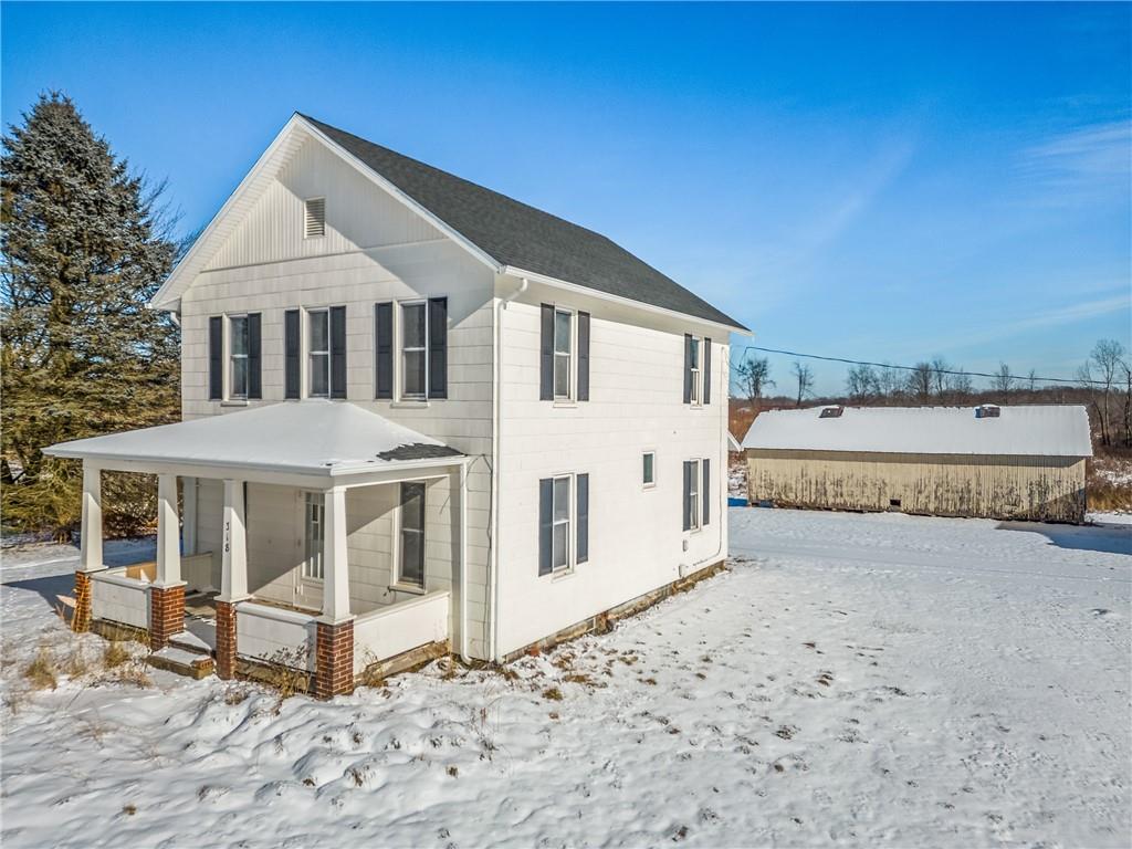 318 Old Ash Road Mercer, PA 16137 - Photo 15 of 15 a front view of a house with a yard