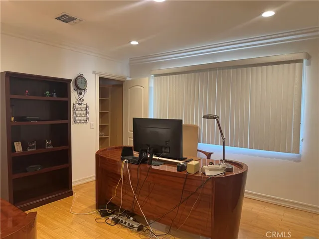 a view of a workspace with furniture