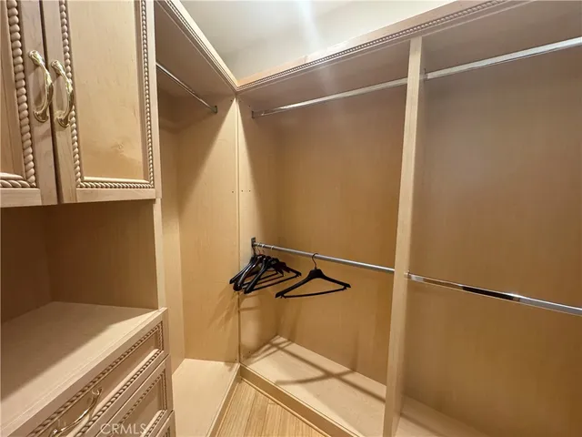 a bathroom with a toilet and a tub