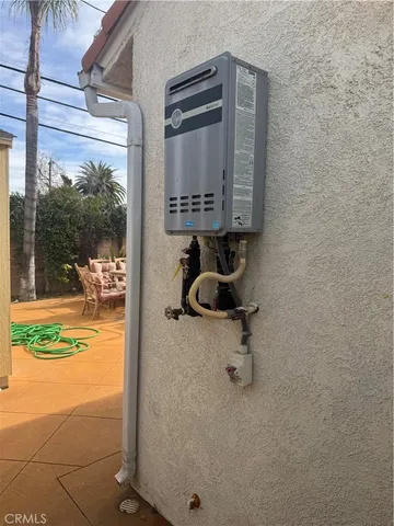 a view of a chairs and table on the patio