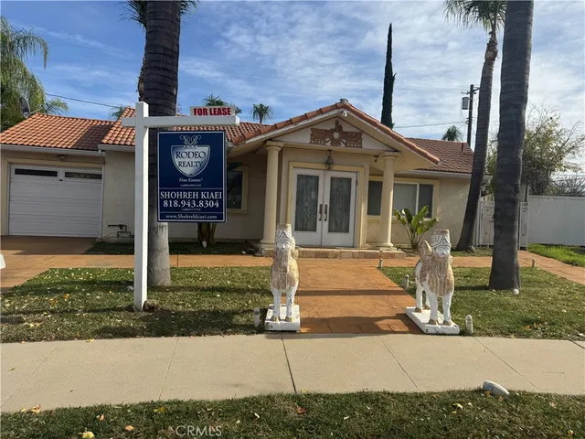 a view of a garage with wooden wall