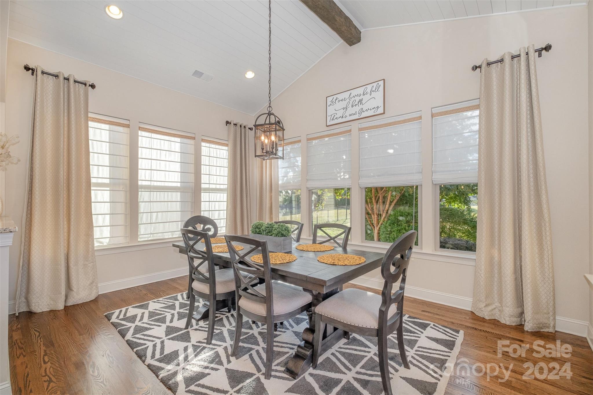 6926 Potter Road Weddington, NC 28104 - Photo 15 of 46 a view of a dining room with furniture window and outside view