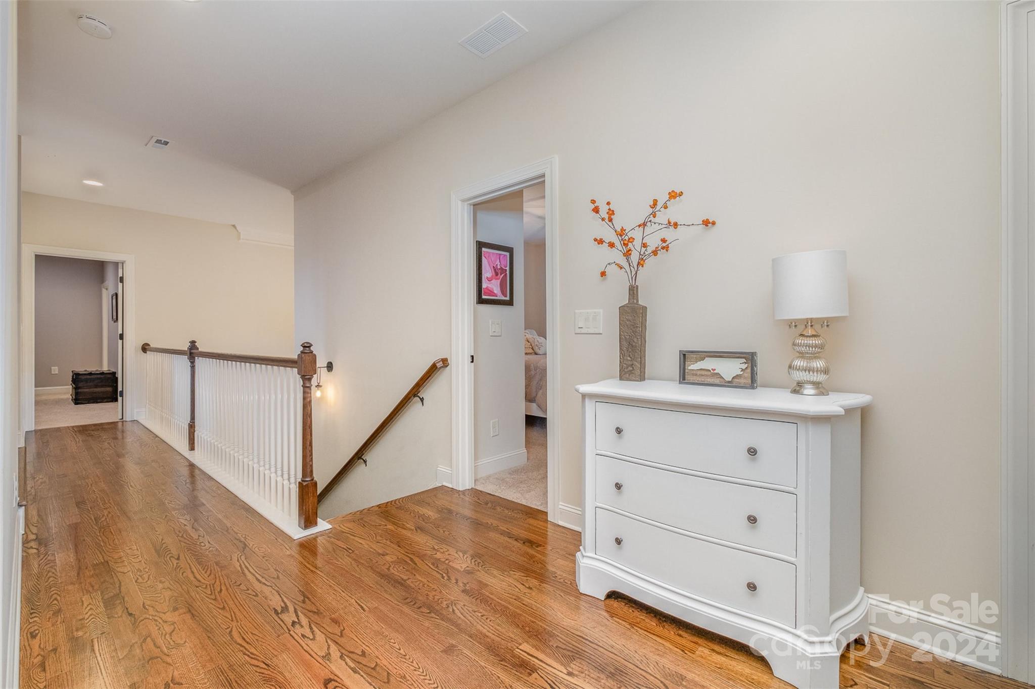6926 Potter Road Weddington, NC 28104 - Photo 25 of 46 a view of a bedroom with wooden floor