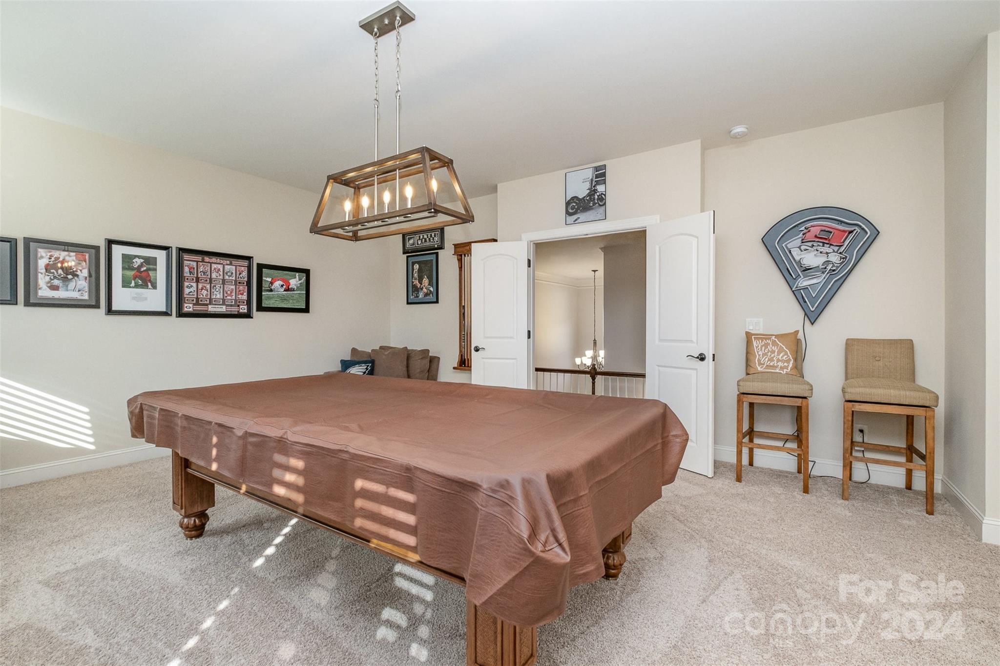 6926 Potter Road Weddington, NC 28104 - Photo 34 of 46 a spacious bedroom with a bed and a table