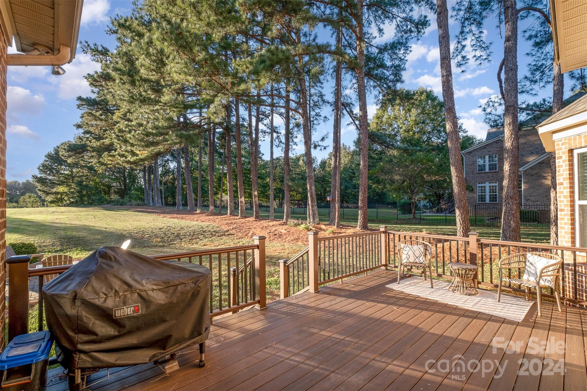 6926 Potter Road Weddington, NC 28104 - Photo 40 of 46 a view of a house with backyard and sitting area