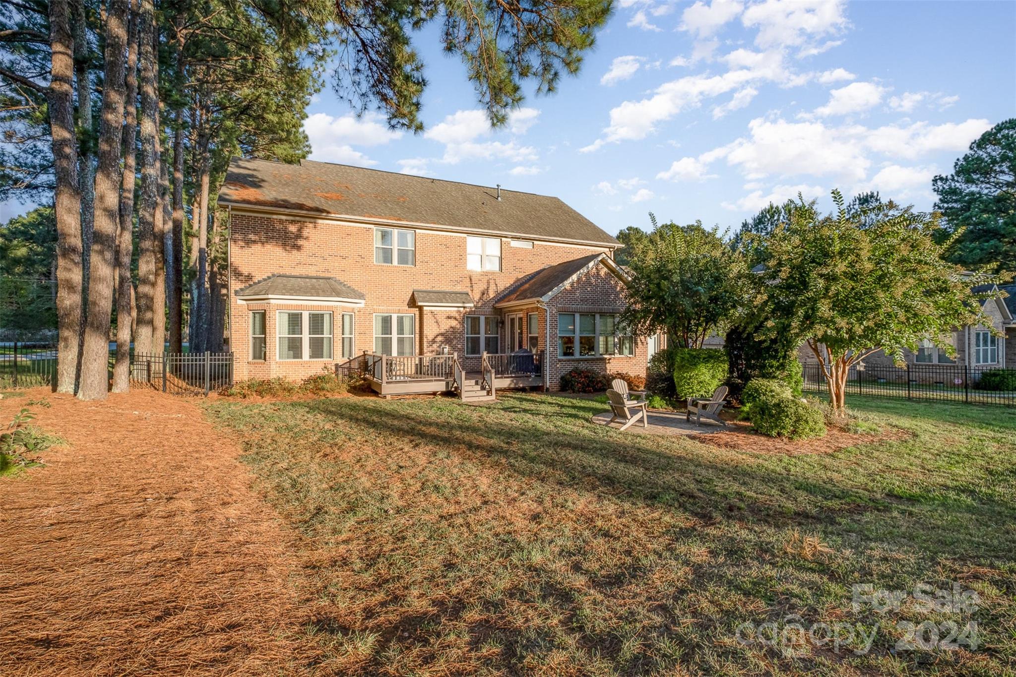 6926 Potter Road Weddington, NC 28104 - Photo 42 of 46 a front view of a house with a yard