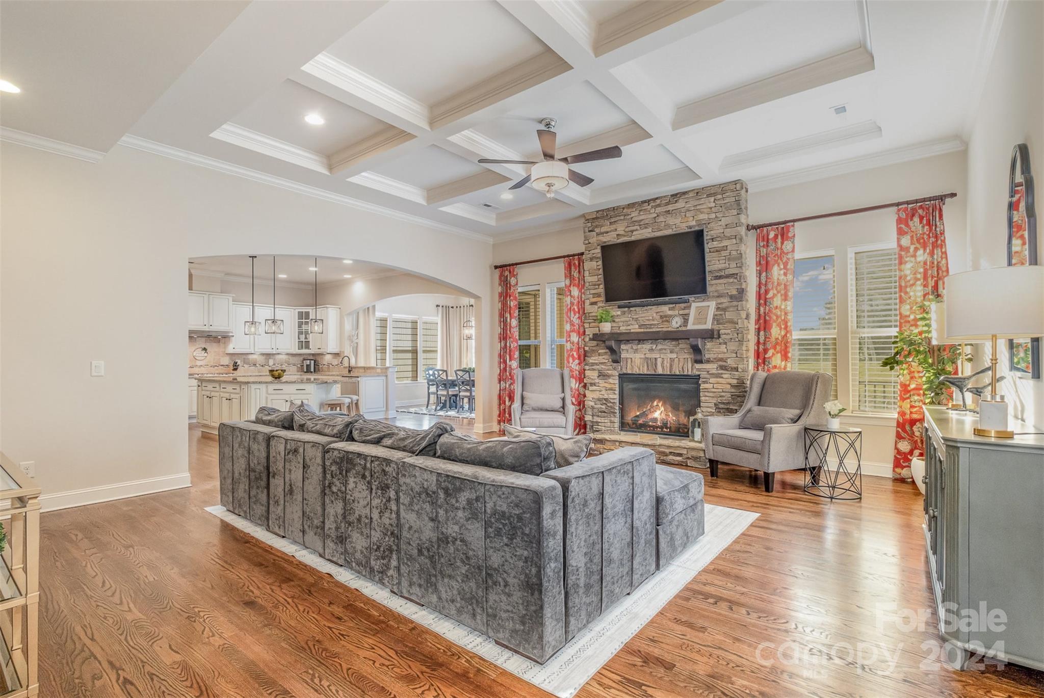 6926 Potter Road Weddington, NC 28104 - Photo 5 of 46 a living room with fireplace furniture and a flat screen tv
