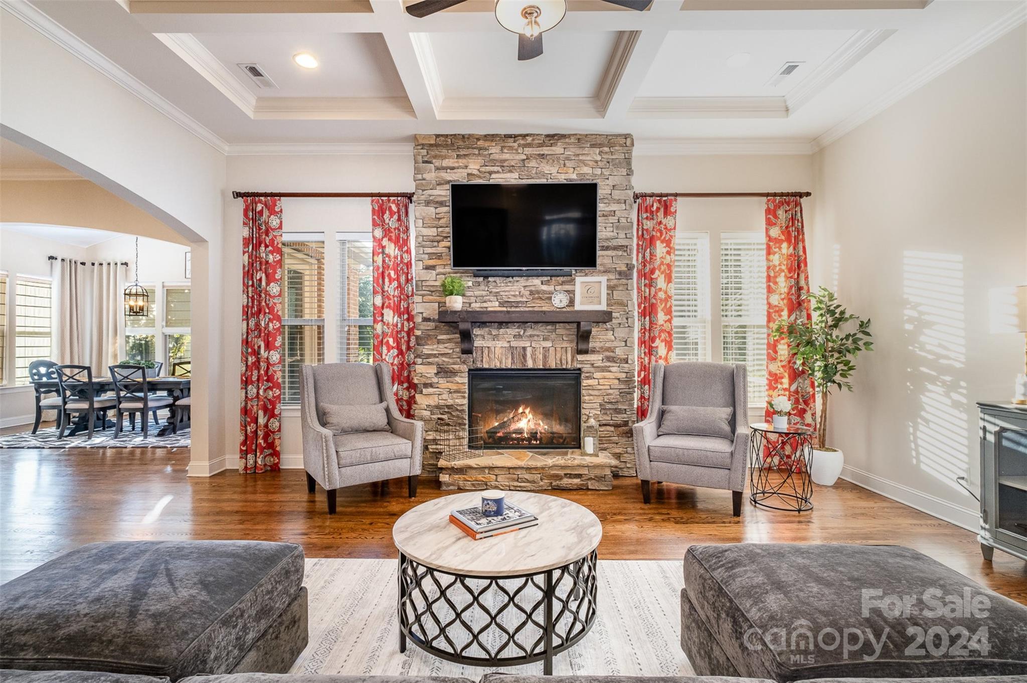 6926 Potter Road Weddington, NC 28104 - Photo 6 of 46 a living room with furniture and a fireplace