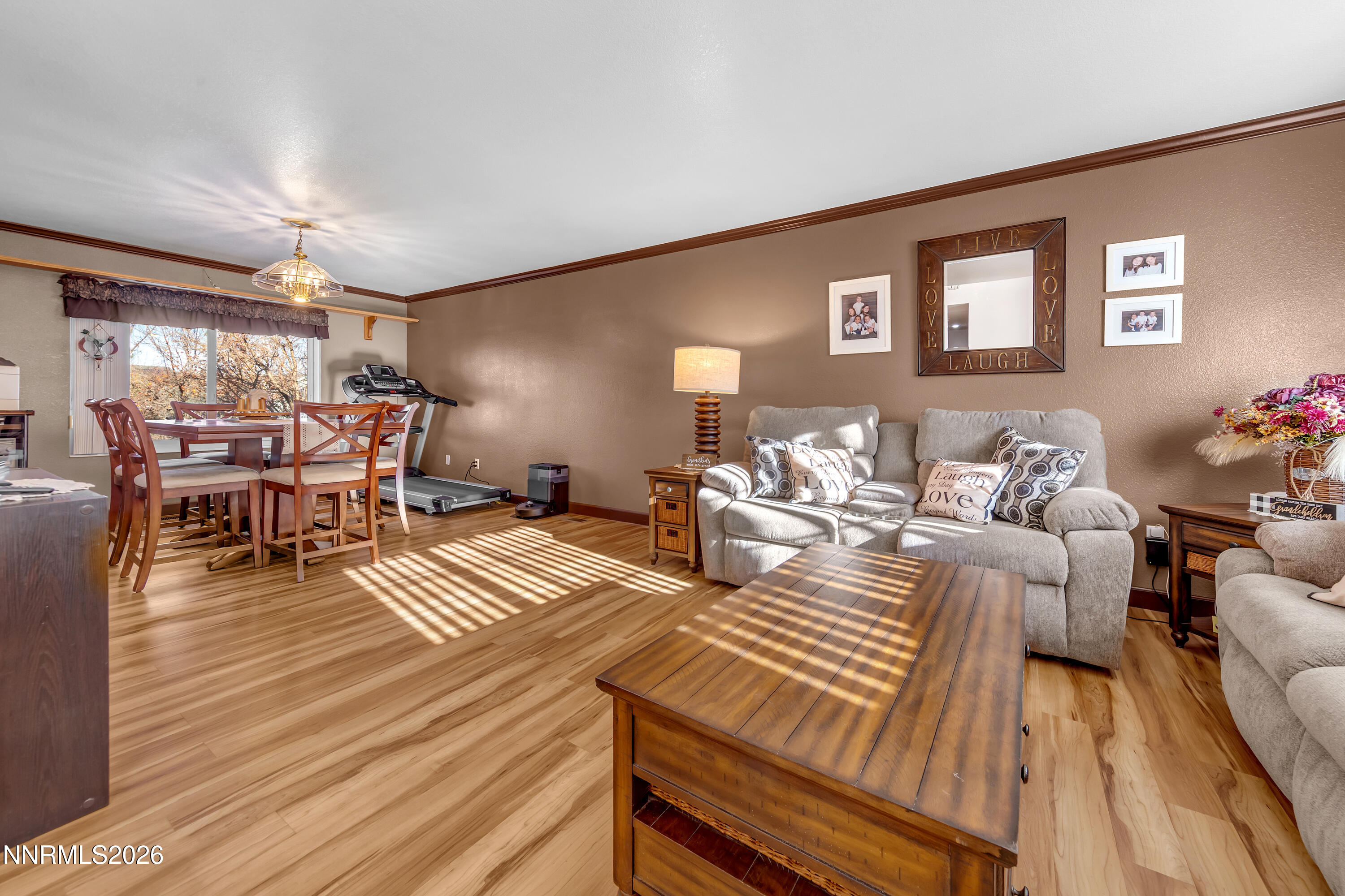 7879 White Falls Court Reno, NV 89506 - Photo 14 of 42 a living room with furniture and wooden floor