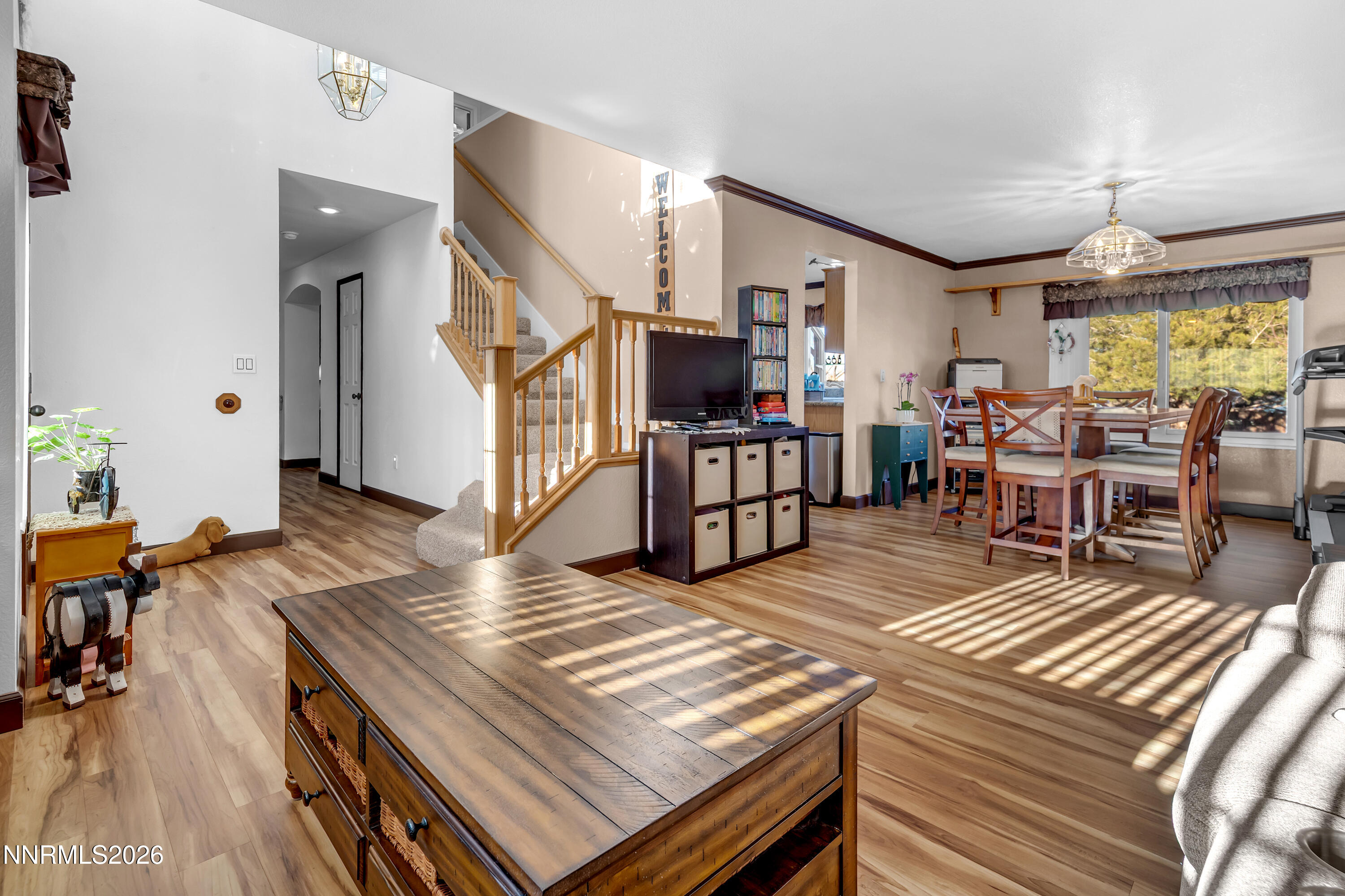 7879 White Falls Court Reno, NV 89506 - Photo 16 of 42 a living room with furniture and a flat screen tv