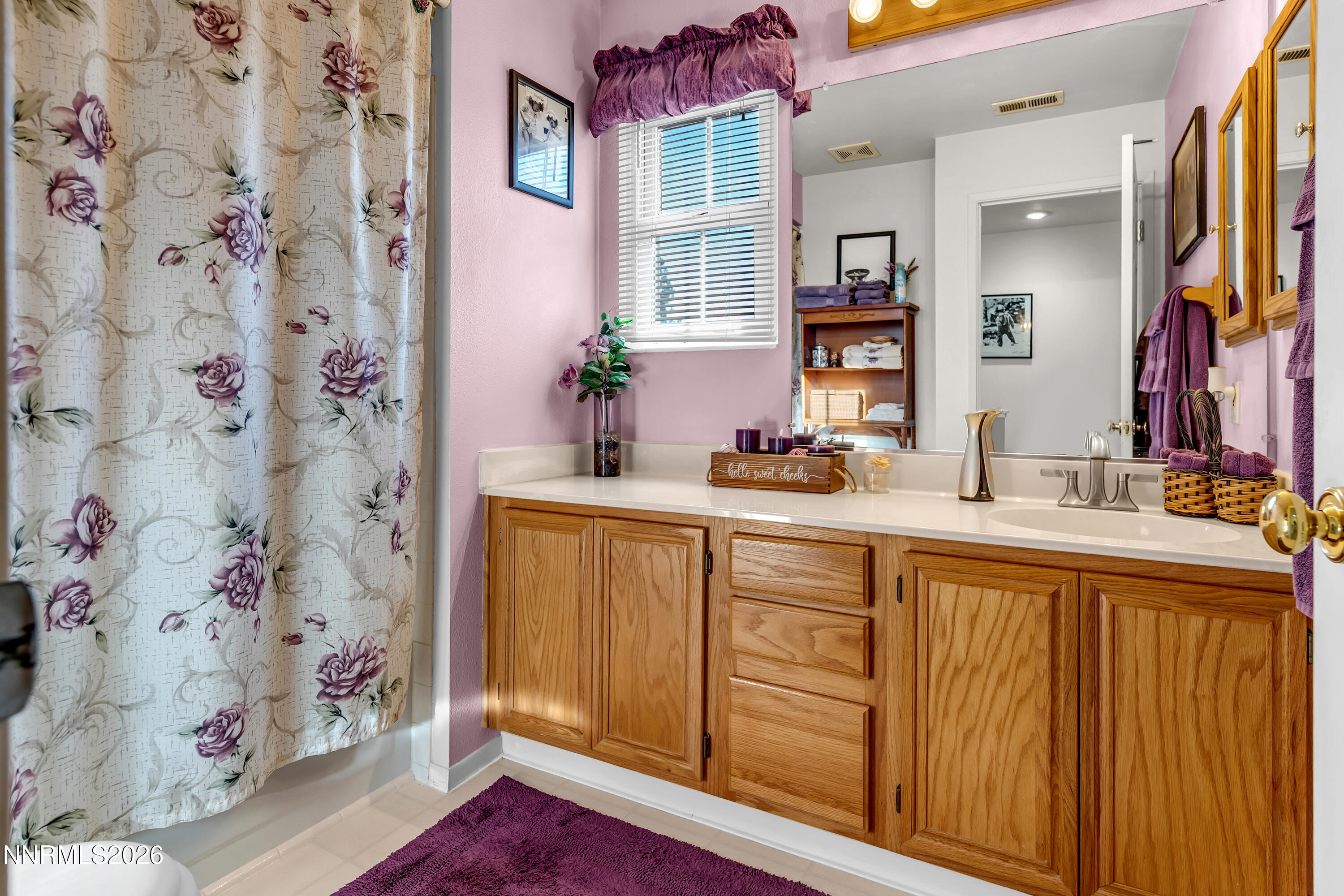 7879 White Falls Court Reno, NV 89506 - Photo 31 of 42 a spacious bathroom with a double vanity sink mirror and