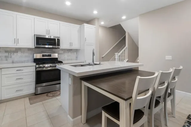 a bed room with a bed and a painting