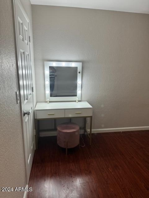 1336 East Mountain View Road, Unit 202 Phoenix, AZ 85020 - Photo 18 of 23 a room with wooden floor and furniture