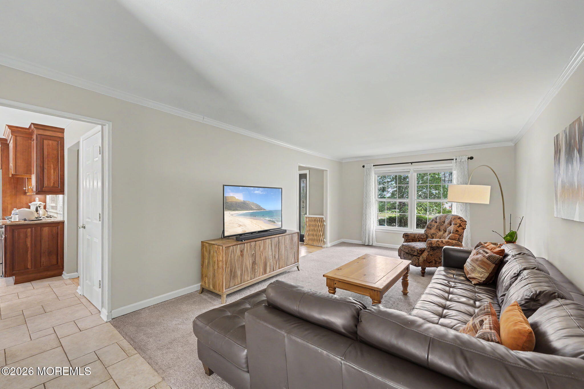 49 Hampton Drive Freehold, NJ 07728 - Photo 12 of 34 a living room with furniture and a flat screen tv