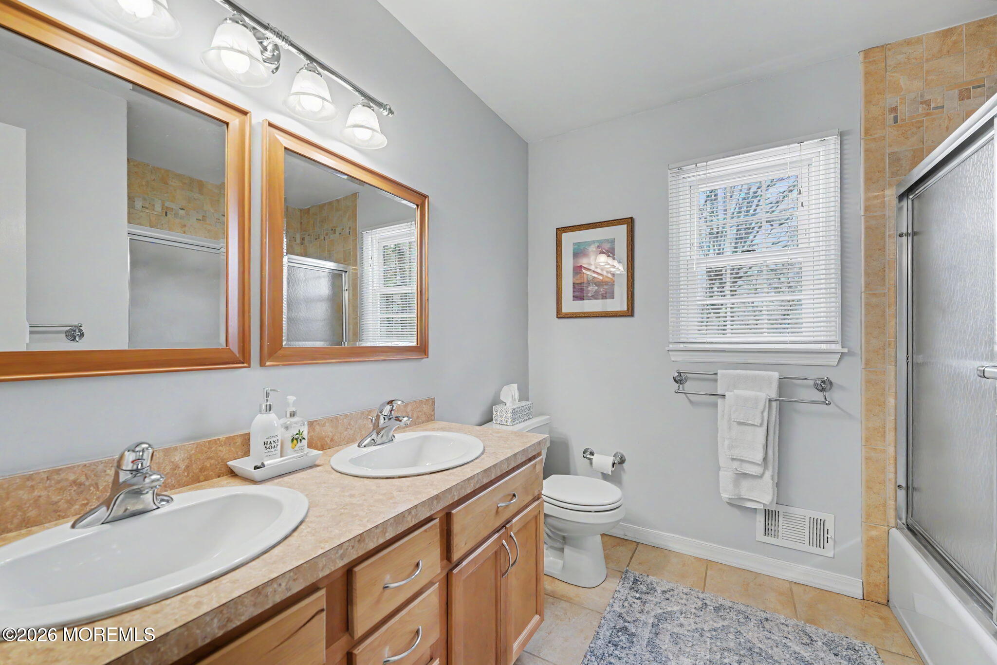 49 Hampton Drive Freehold, NJ 07728 - Photo 26 of 34 a bathroom with a granite countertop sink toilet and shower
