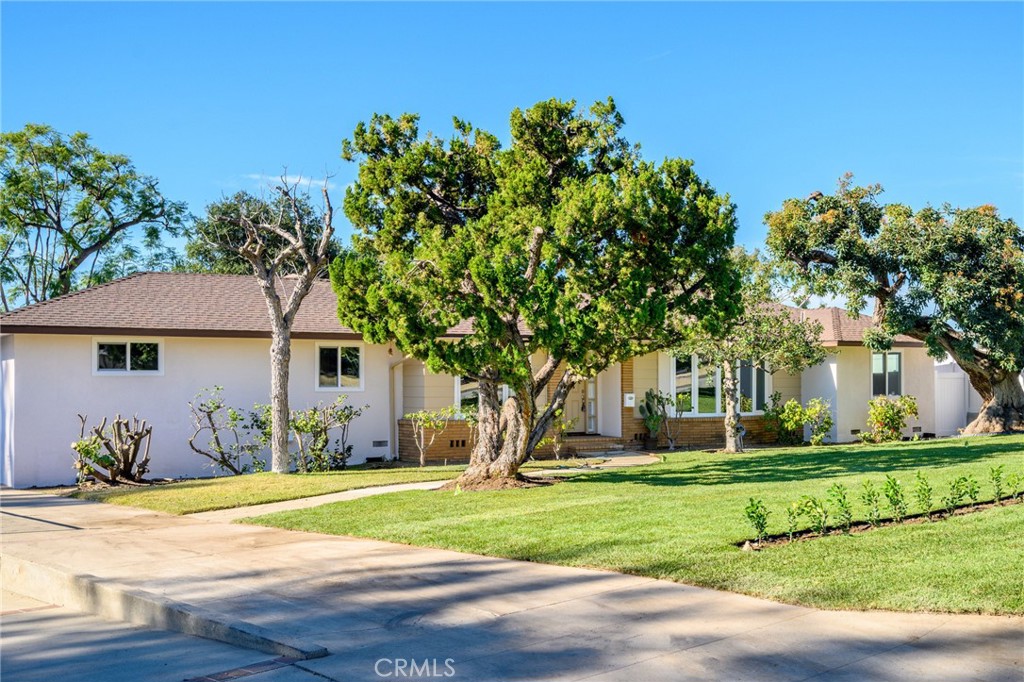 685 Rim Road Pasadena, CA 91107 - Photo 24 of 27 a front view of a house with garden