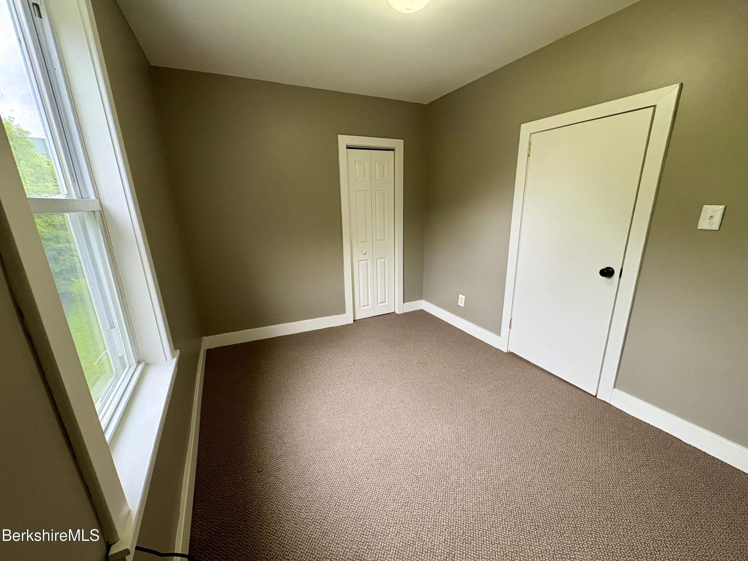 319 Old Columbia Street Adams, MA 01220 - Photo 11 of 15 an empty room with windows
