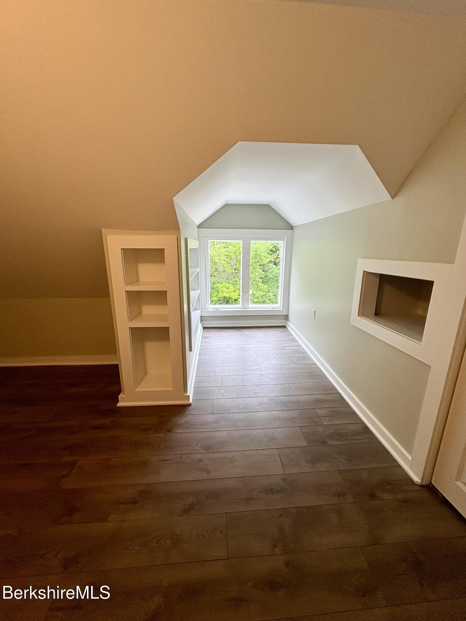 319 Old Columbia Street Adams, MA 01220 - Photo 15 of 15 a view of an empty room with a window and wooden floor