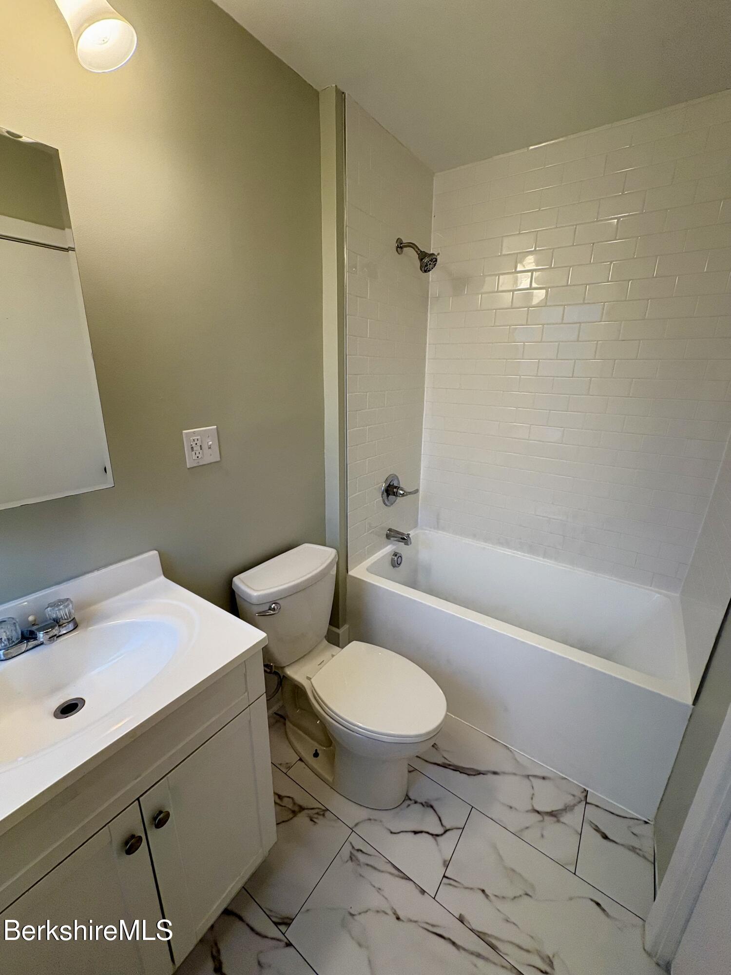 319 Old Columbia Street Adams, MA 01220 - Photo 7 of 15 a bathroom with a sink toilet vanity and shower