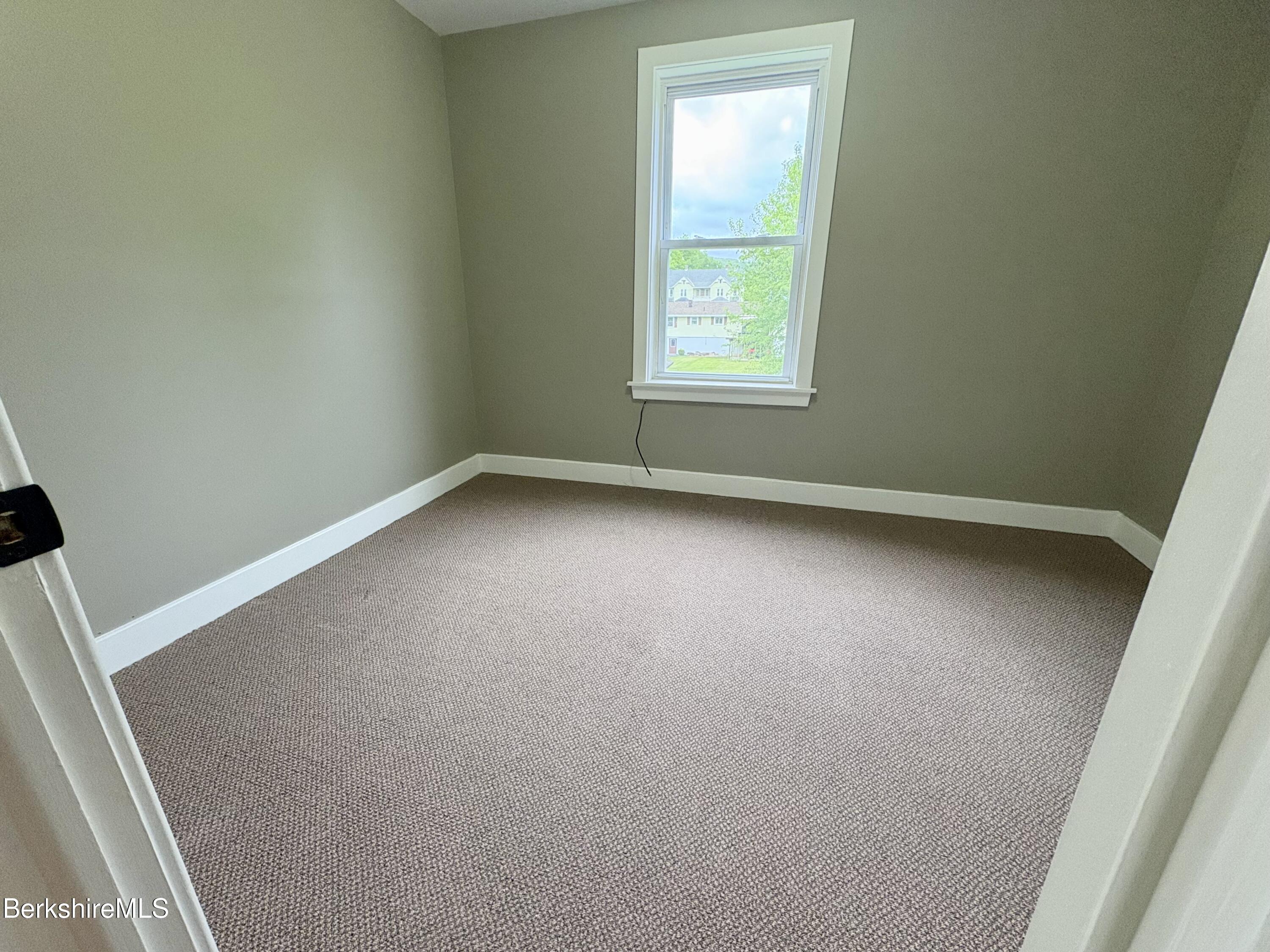 319 Old Columbia Street Adams, MA 01220 - Photo 9 of 15 an empty room with a window